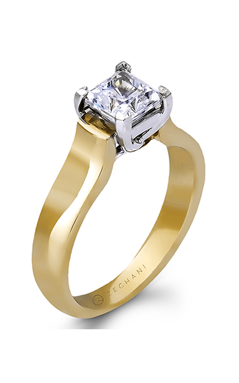 A yellow gold solitaire engagement ring with square cut diamond