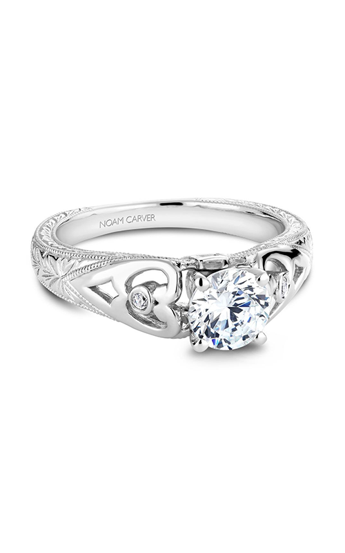 A white gold sidestone engagement ring with intricate metalwork.