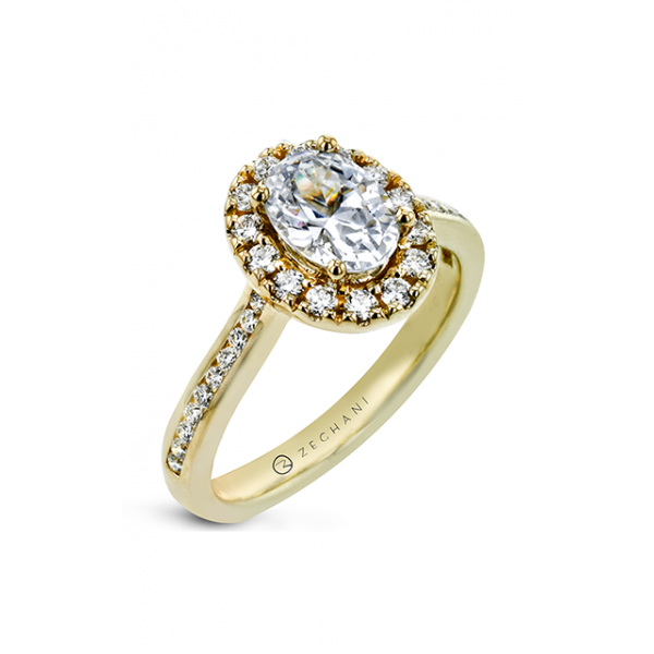 A yellow gold halo engagement ring, adorned with small diamond half way through the band