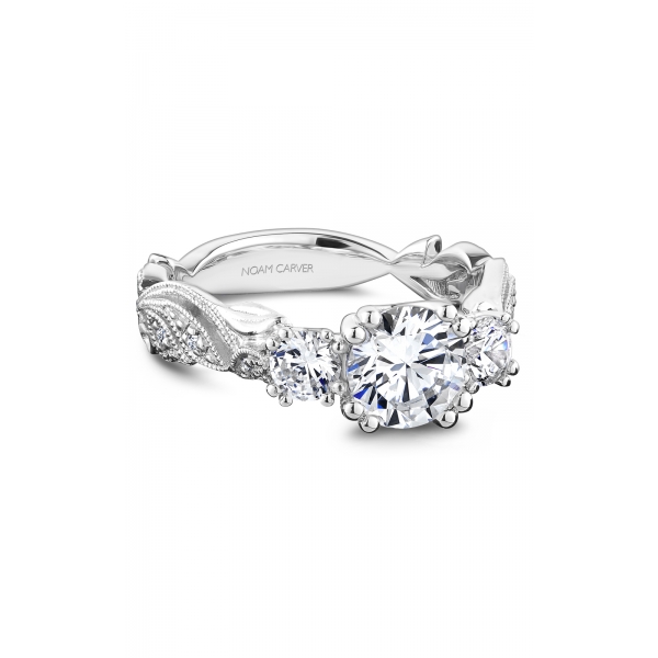 A white gold three stone engagement ring with round cut diamonds