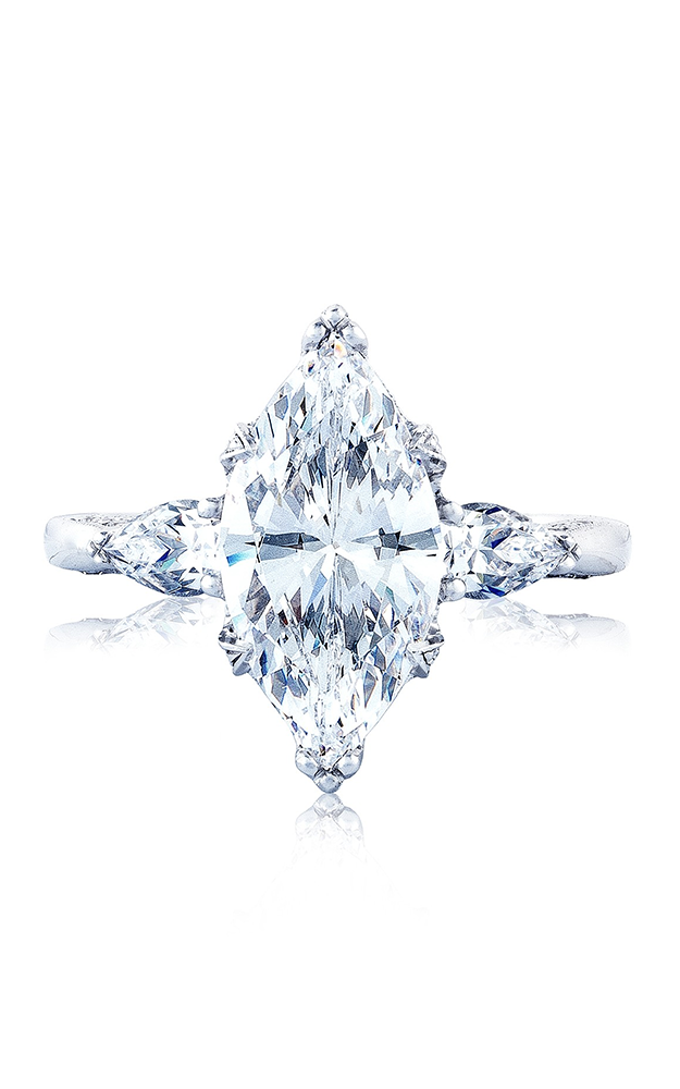 A white gold three stone marquise cut engagement ring