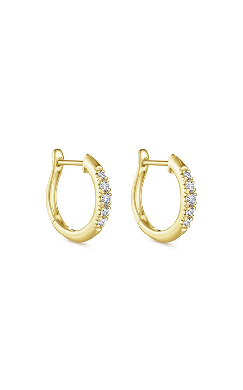 A yellow gold huggies earrings with channel set diamonds.