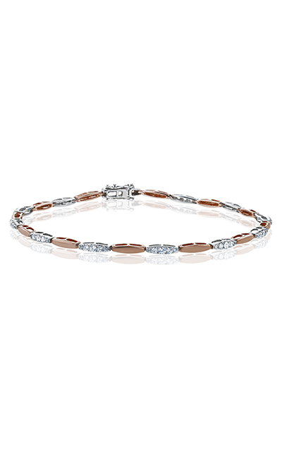A rose and white gold bracelet, accented with diamonds.