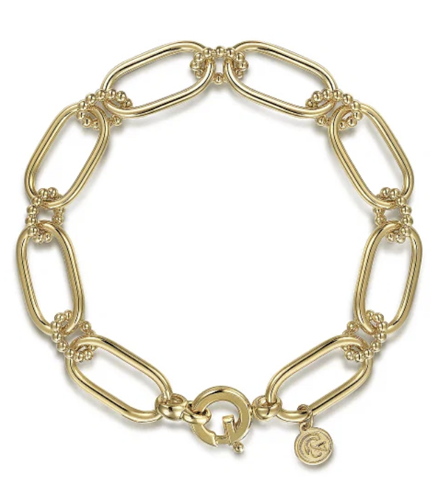 A yellow gold chain bracelet.