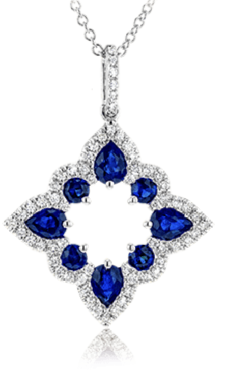 A white gold diamond and sapphire pendant in a flower shape.