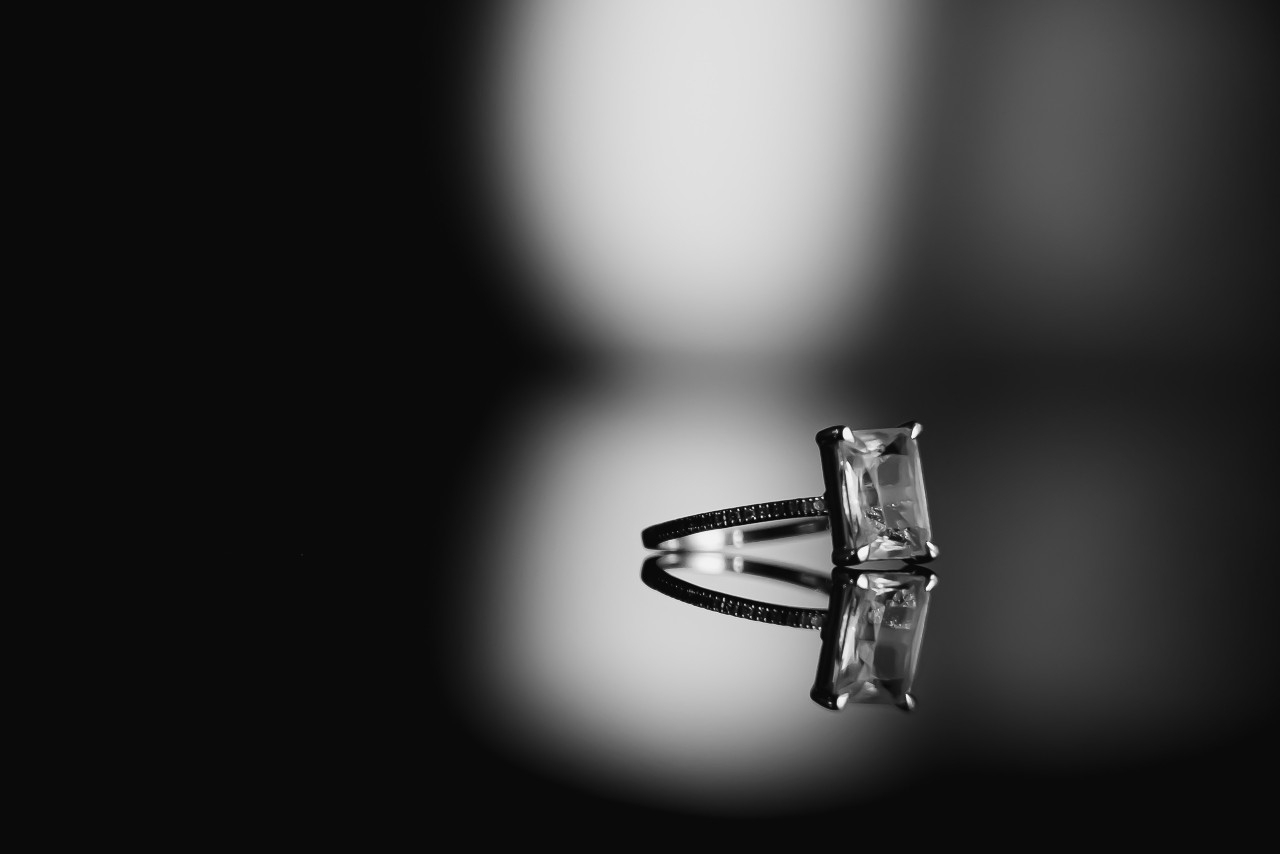 Solitaire engagement ring with princess cut diamond