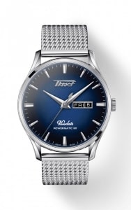 A retro-style watch from Tissot Heritage Visodate features a blue dial