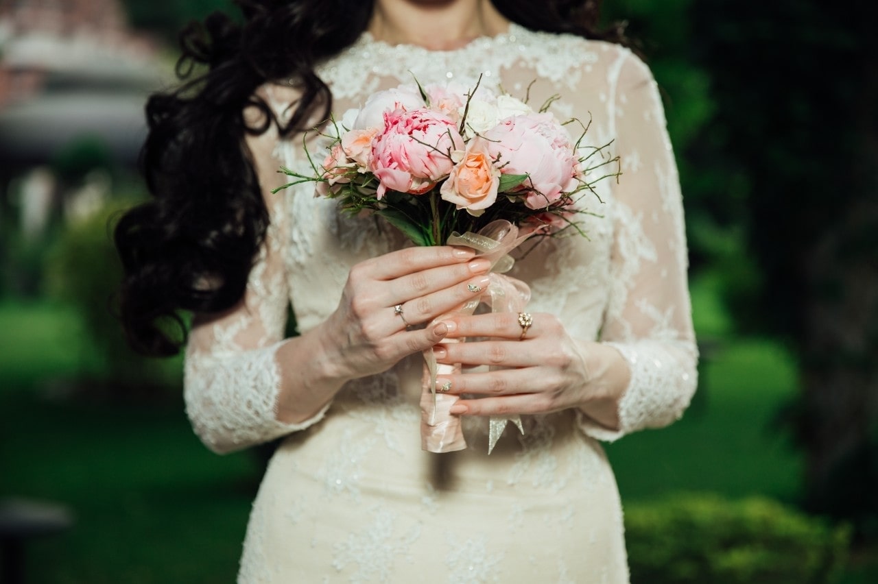 Bridge holding flowers at her wedding