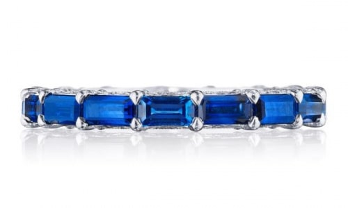 A TACORI eternity wedding band featuring emerald-cut sapphires.