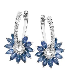a pair of diamond hoops with a sapphire flower motif.