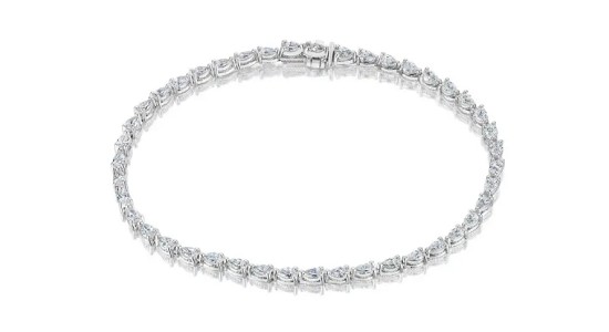 a white gold diamond tennis bracelet from TACORI’s Still collection