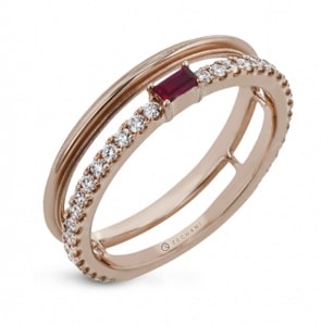 A Zeghani Precious Stones ruby fashion ring with diamond accents.