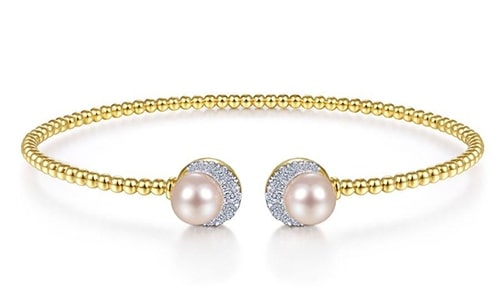 a pink pearl cuff bracelet from Gabriel & Co.’s Bujukan collection.