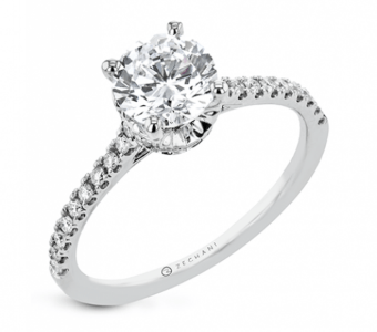 An under halo side stone engagement ring from Zeghani’s Under Stone collection.
